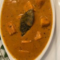 Paneer Butter Masala · Indian cheese cooked in a tomato based sauce.