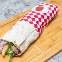 Kabab Sandwich · Seasoned ground beef grilled over an open flame, tomato, onions, lettuce, parsley, house gar...