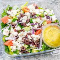 Greek Salad · Lettuce, tomato, cucumber, onions, olives, feta cheese, and oregano with lemon juice and oli...