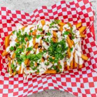 Habibi'S Fries · French fries drizzled with house garlic sauce and topped with scallions.