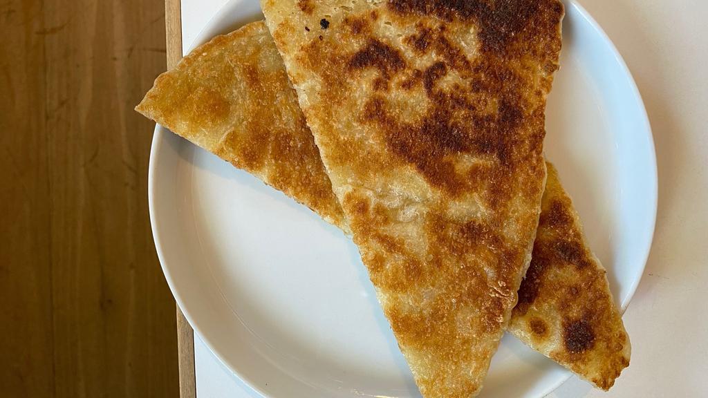 Flaky Bread · malawach, a Yemeni flaky flatbread, buttery and griddled. (vegetarian)