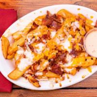 Monster Fries · Large serving of Steak fries topped with bacon, onions and melted cheese. Choice of Ranch or...