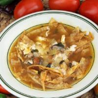 Tortilla Soup · Chipotle chicken soup with tortilla strips and cheese.