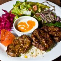Kofte Kebap · Ground lamb and beef, seasoned with garlic, onions, and parsley in patties.