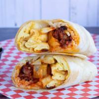 Sausage Burrito · Breakfast burrito stuffed with scrambled eggs, potatoes, spicy sausage, salsa, melty cheese.