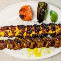 Ground Chicken And Ground Beef Combo Kebab · Served with grilled tomato, pepper and rice.