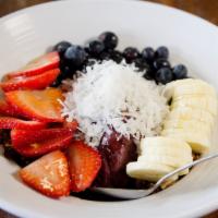 Acai Bowl · Topped with granola, berries, bananas, coconut and honey.