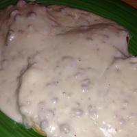 Biscuits & Gravy · 2 homemade biscuits with homemade country gravy.
