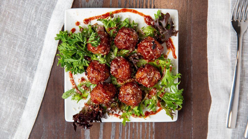Bourbon Meatballs · Beef and pork meatballs slow-cooked in our mouthwatering bourbon BBQ sauce.