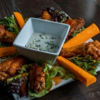 Chicken Wings · Buffalo wings with our house-made bleu cheese dressing and carrot sticks.