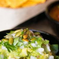 Chips & Guacamole · avocado, onion, cilantro, tomato, pepitas, corn tortilla chips