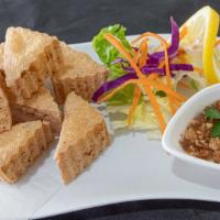 Fried Tofu · Deep fried tofu, served with sweet and sour sauce.