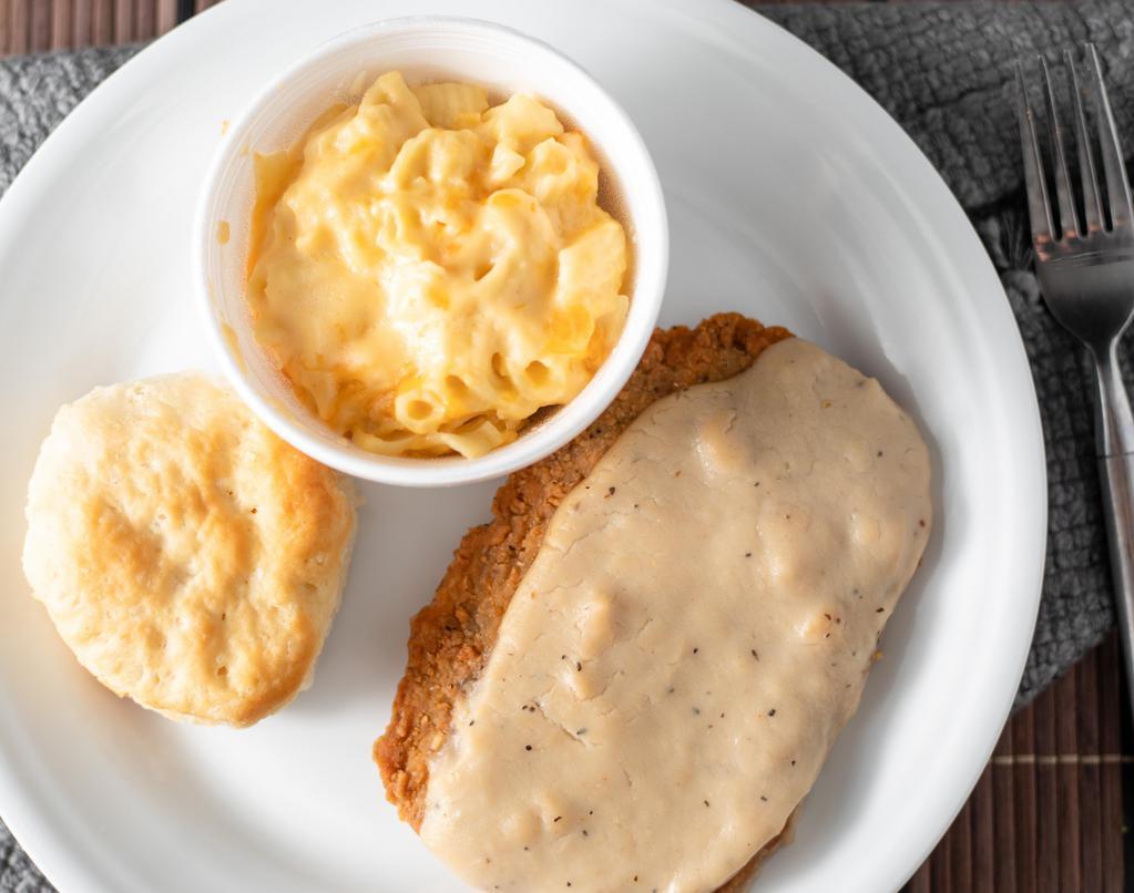 Chicken Fried Steak · Country steaks smothered in house gravy. Includes two fixin's and bread.