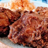 2 Piece Dark Plate · 1 Thigh and 1 Leg.  
Includes Baked Beans and Cole Slaw.