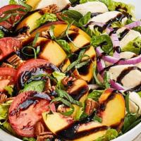 Peach Summer Salad · Spinach and Romaine lettuce, mozzarella cheese, red onions, Roma tomatoes, fresh peach slice...