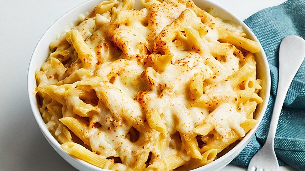 Cheesy Alfredo  · Cheesy Alfredo: Penne pasta, with creamy alfredo sauce, mozzarella and feta cheese topped with fresh garlic then baked to a perfectly golden brown..