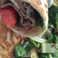 Gyros Wrap · Lettuce, Tomato, Gyro, and Garlic Sauce. Also comes with a side of Pilaf Rice and Fattoush S...