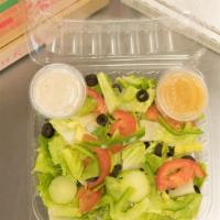 Greek Salad · Lettuce, diced tomatoes, black olives, cucumber, red onion, feta cheese, balsamic vinaigrette.
