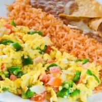 Huevos A La Mexicana · Eggs, jalapeños, onions, tomato, served with rice, beans, and three (corn) handmade tortillas.