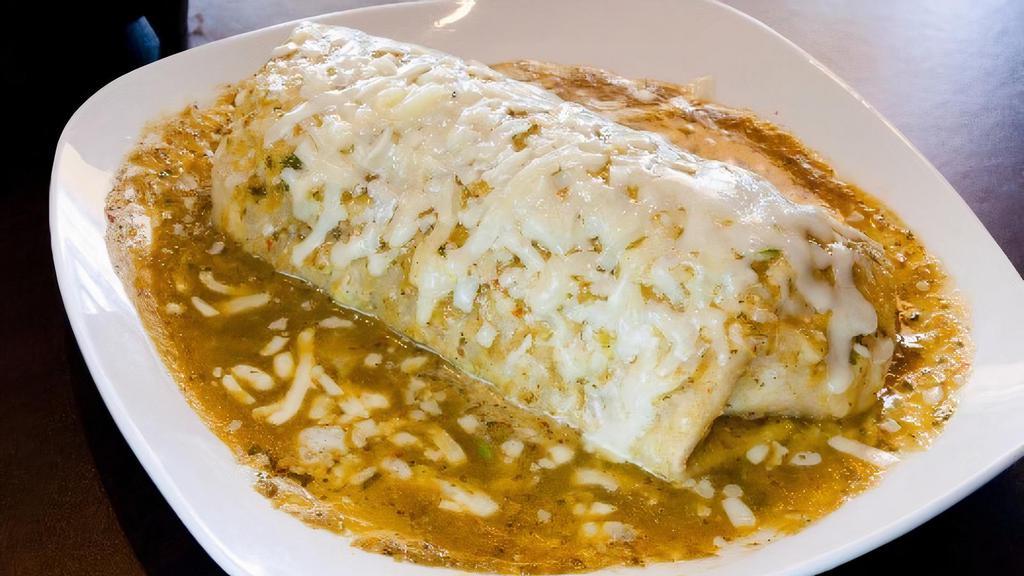 Wet Burrito · Your choice of meat, rice, beans, onions, cilantro, and topped with red sauce or green sauce and cheese.