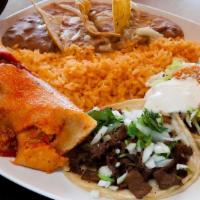 Grandma'S Special Plate · Served with one tamale, one sope, one taco, rice, and beans.