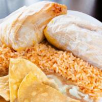 Tamale Plate · Served with two tamales, rice and beans.