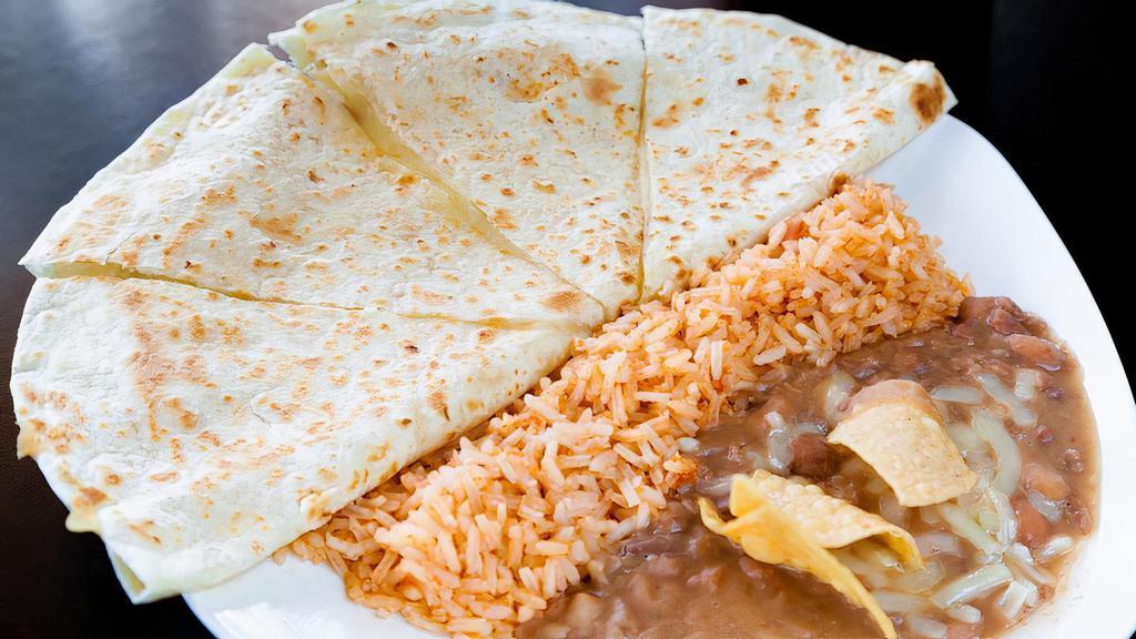 Flour Quesadilla With Meat · Served with rice and beans.