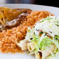 Taquito Plate · Served with three taquitos, (beef or chicken), lettuce, tomato, sour cream, guacamole, and r...