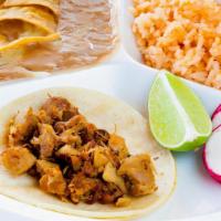 Kids Taco Plate · One taco, rice and beans.
