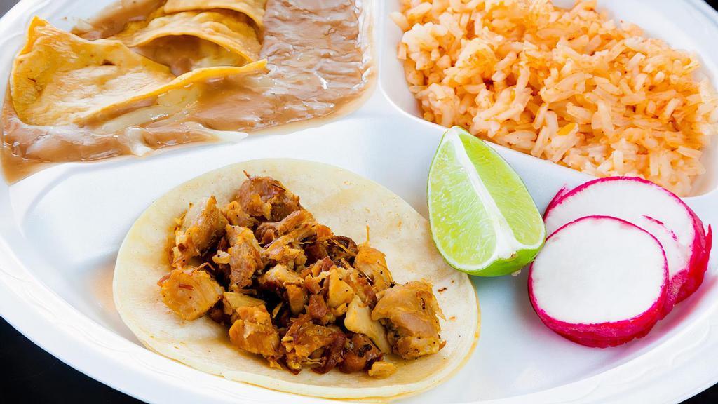 Kids Taco Plate · One taco, rice and beans.