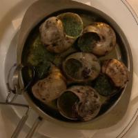 Escargots De Bourgogne · 1/2 dozen escargot imported from Bourgogne, France, and baked in the shell with fresh garlic...