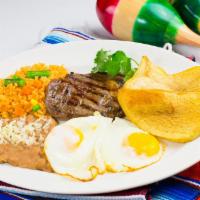Huevos, Steak, Y Papas · eggs with steak and potatoes served with rice and beans and tortillas.