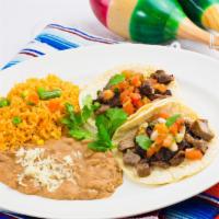 Tacos Plate (2) · Asada, chicken, barbacoa, carnitas, al pastor.