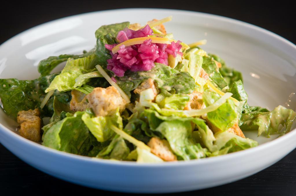 Caesar · zesty citrus dressing with herbal croutons

(contains gluten)
(contains nuts)