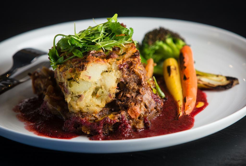Shepherds Pie · meatless loaf mixed with carrots, onions, gravy and topped with mashed potato, served with broccoli and demi glace