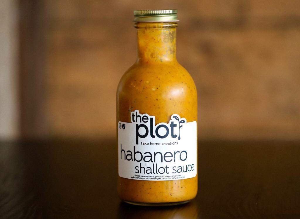 Habanero Shallot Sauce Bottle  · Savory with a little spice, perfect accompaniment to our friend chickën. 
(contains nuts)