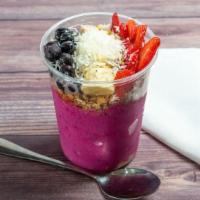 Pitaya Bowl · Large Pitaya Bowl comes blended with strawberries, banana, and apple juice. Topped with gran...