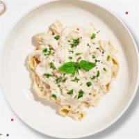 Italian Alfredo Adventure Pasta · The one and only, futtuccine alfredo! Fettuccine pasta cooked in creamy white sauce and aged...