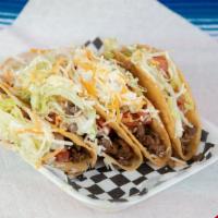 Tacos Dorados · Freshly Made Hard shell Tacos, Choice of meat, sour cream, monterrey jack cheese, pico de ga...