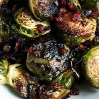 Caramelized Brussels Sprout · Deep fried Brussels sprout, Shaved parmesan, bacon and balsamic glaze drizzle.