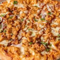 Bbq Chicken Pizza · BBQ sauce base topped with mozzarella cheese , marinated BBQ chicken, red onions, and cilant...