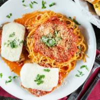 Chicken Parmigiana · Seasoned and breaded chicken breast baked with marinara sauce, topped with mozza rella and p...
