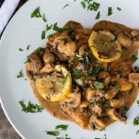Lemon Chicken Piccata With Mushrooms · Tender chicken breast sautéed in EVOO, white wine with chili pepper, mushrooms, capers and l...