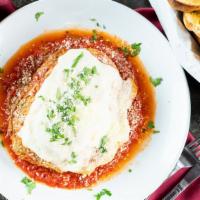 Eggplant Parmigiana · Layers of thinly sliced eggplant in a delicate batter with choice of meat or marinara sauce,...