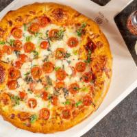 Pizza Margherita · Fresh mozzarella, fresh sliced cherry tomatoes, extra virgin olive oil, fresh basil. The ori...