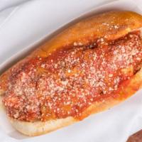 Goomba · A chicken sausage with melted mozzarella cheese, a chopped chicken tender, topped with marin...