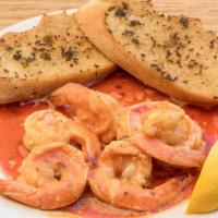 Hot And Spicy Shrimp · A half dozen jumbo shrimp sauteed in our Louisiana pepper butter. Served with toasted baguet...