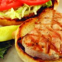 Grilled Chicken Sandwich · Charbroiled chicken breast with lettuce, tomatoes, red onions, and pickle. Veggie patties ar...