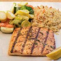 Norwegian Salmon · A lightly seasoned fillet of salmon flame-broiled and topped with a hint of garlic butter. W...