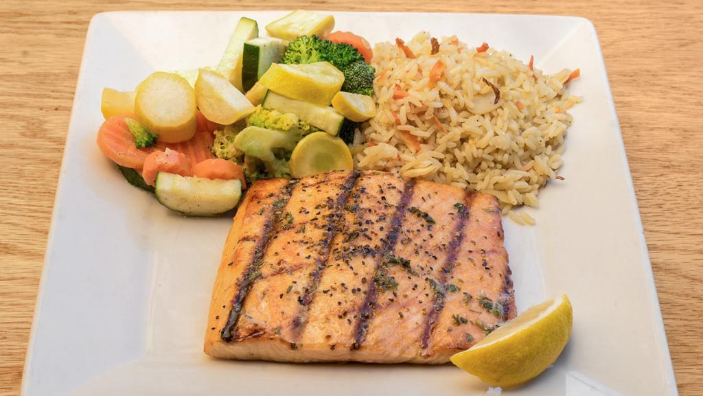 Norwegian Salmon · A lightly seasoned fillet of salmon flame-broiled and topped with a hint of garlic butter. We pride ourselves on serving not only the finest beef, but outstanding seafood and pasta to match.